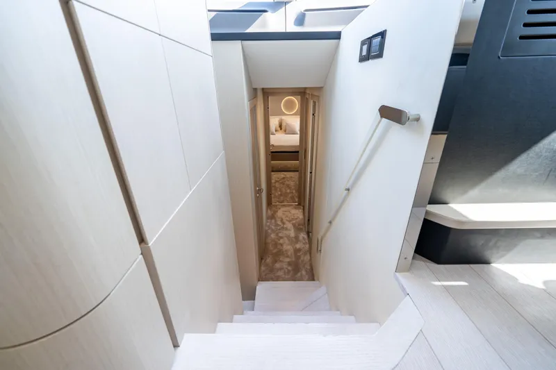 Slide: The Image of Stairway leading to a luxurious cabin in the 2024 Azimut Fly 68 yacht. - 37