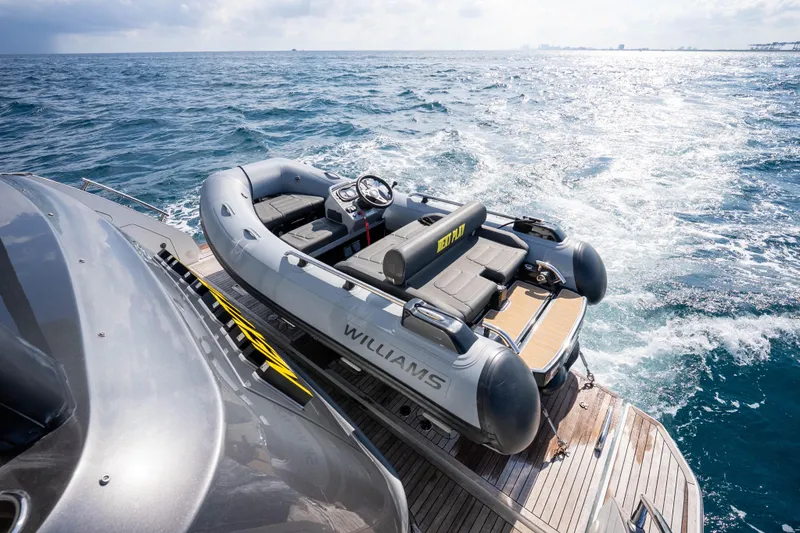 Slide: The Image of Azimut Fly 68 yacht with Williams tender on ocean, 2024 model. - 40