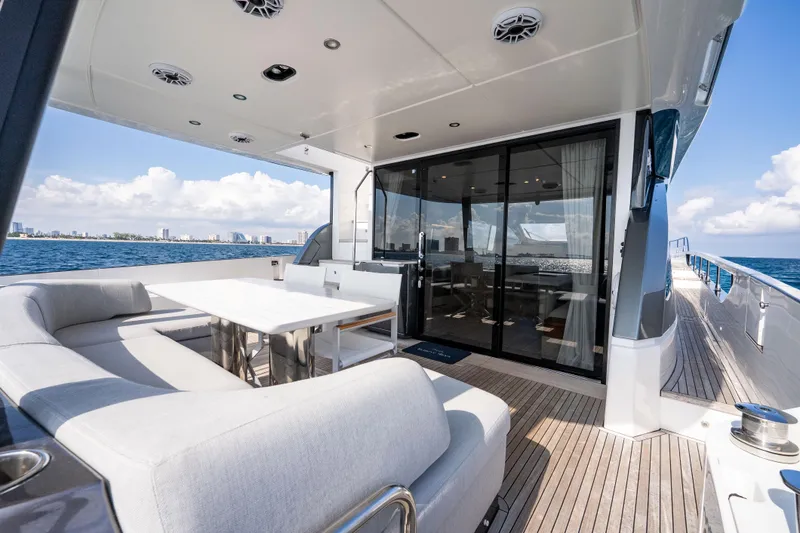 Slide: The Image of Luxurious 2024 Azimut Fly 68 yacht deck with elegant seating and ocean view. - 45