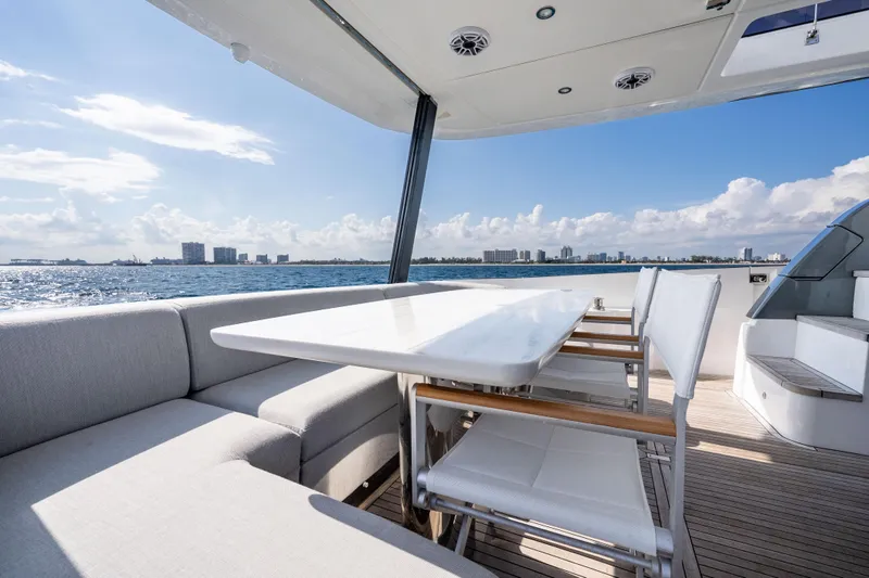 Slide: The Image of Luxurious 2024 Azimut Fly 68 yacht deck with elegant seating and ocean view. - 46