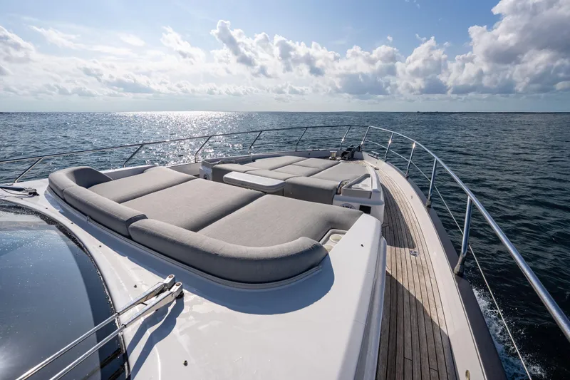 Slide: The Image of Luxurious 2024 Azimut Fly 68 yacht deck with sun loungers on open sea. - 47