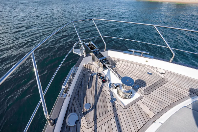 Slide: The Image of Bow of 2024 Azimut Fly 68 yacht with teak decking and anchor system. - 48