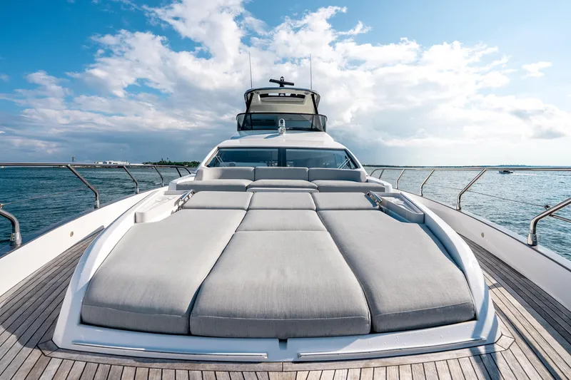 Slide: The Image of 2024 Azimut Fly 68 yacht with luxurious sunbathing deck on open sea. - 49