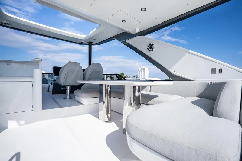Slide: The Image of Luxurious 2024 Azimut Fly 68 yacht interior with modern seating and sleek design. - 59