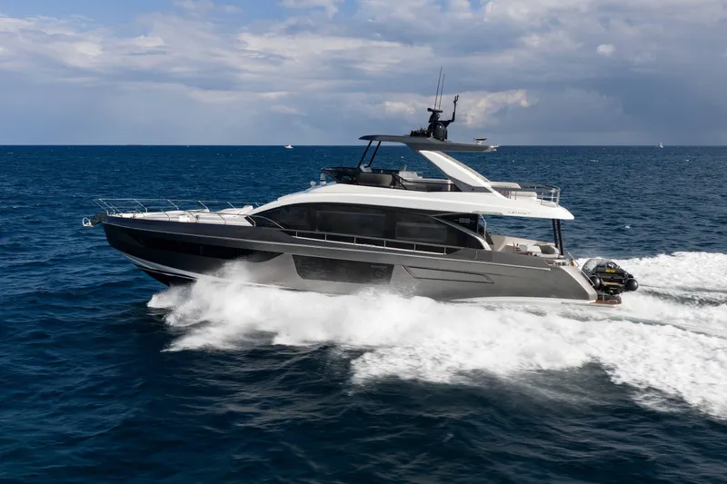 Slide: The Image of 2024 Azimut Fly 68 yacht cruising on open sea under cloudy sky. - 6