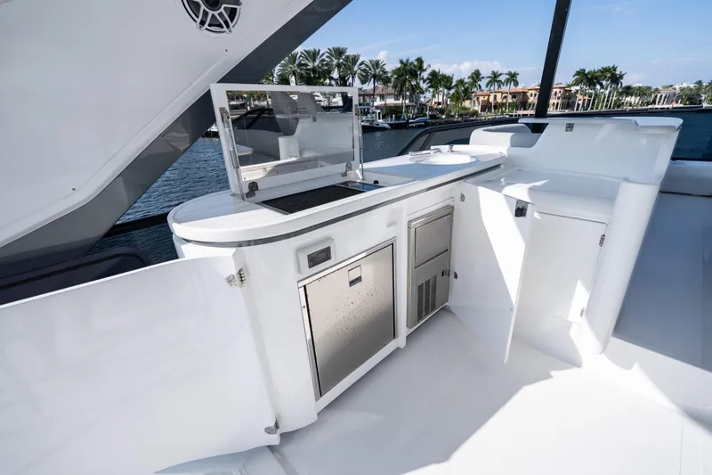 Slide: The Image of Luxurious outdoor kitchen on 2024 Azimut Fly 68 yacht, featuring sleek design and modern amenities. - 61
