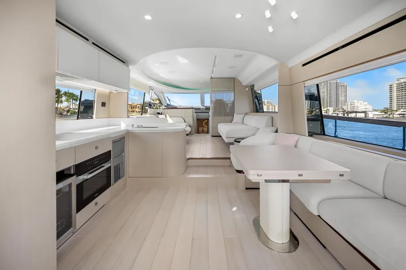 Slide: The Image of Luxurious interior of 2024 Azimut Fly 68 yacht with modern kitchen and seating area. - 62