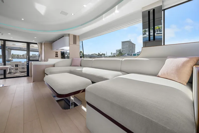 Slide: The Image of Luxurious interior of 2024 Azimut Fly 68 yacht with modern seating and large windows. - 66
