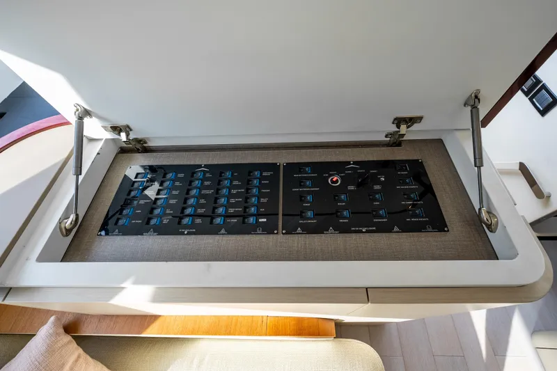 Slide: The Image of Control panel of 2024 Azimut Fly 68 yacht, featuring modern switches and sleek design. - 70