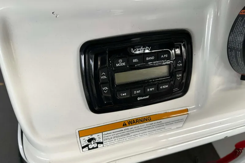 Slide: The Image of Infinity stereo system on 2015 PlayCraft 25 Clipper boat dashboard. - 12