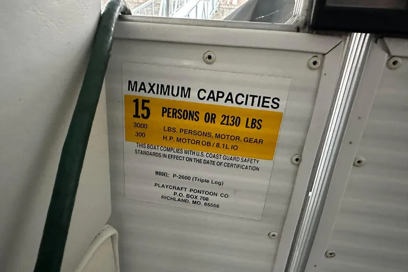 Slide: The Image of 2015 PlayCraft 25 Clipper capacity label, 15 persons or 2130 lbs maximum. - 16