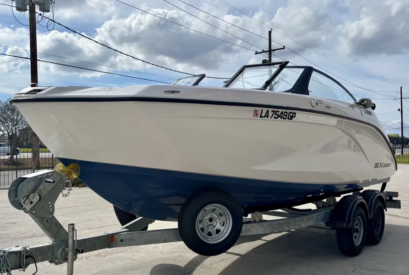 Slide: The Image of Interior of 2023 Yamaha SX 220 boat with modern seating. - 10