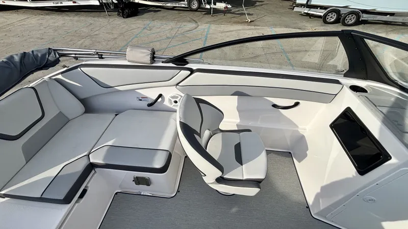 Slide: The Image of Engine compartment of 2023 Yamaha Boats SX 220. - 13