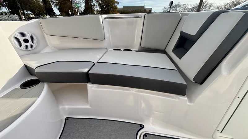 Slide: The Image of Interior of 2023 Yamaha SX 220 boat with gray upholstery. - 19