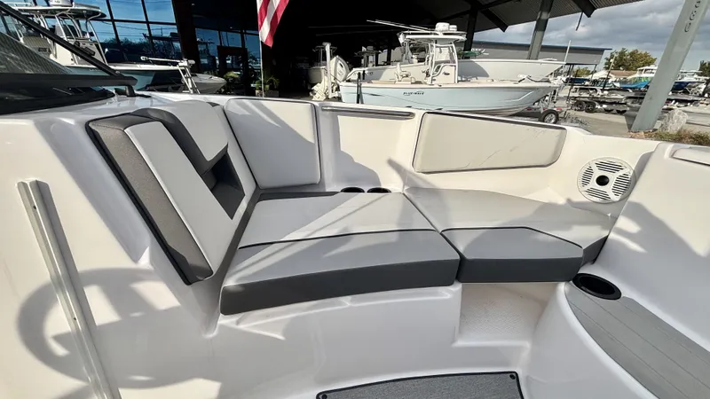 Slide: The Image of Interior of Yamaha SX 220 boat, 2023 model, featuring gray seating. - 24