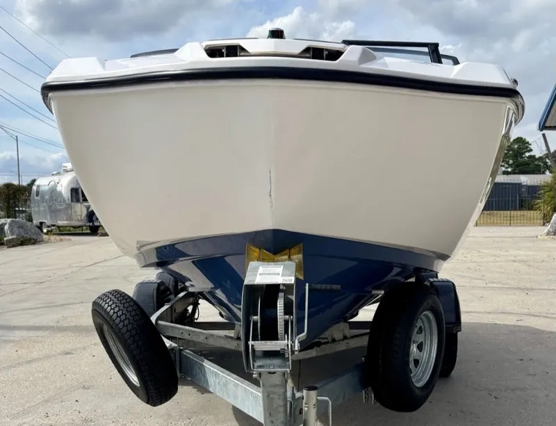 Slide: The Image of Interior of Yamaha SX 220 boat, 2023 model, featuring gray upholstery. - 28