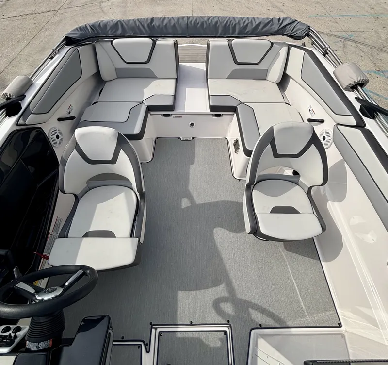Slide: The Image of Interior of 2023 Yamaha SX 220 boat with gray upholstery. - 4