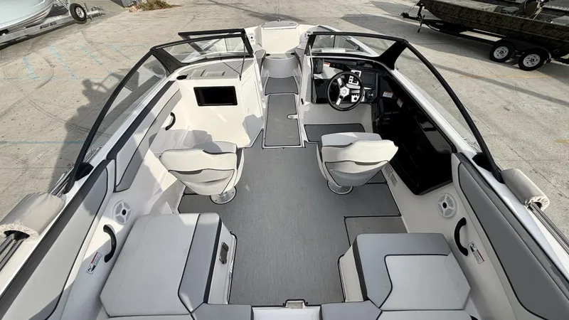 Slide: The Image of Interior of 2023 Yamaha SX 220 boat with gray seating. - 7