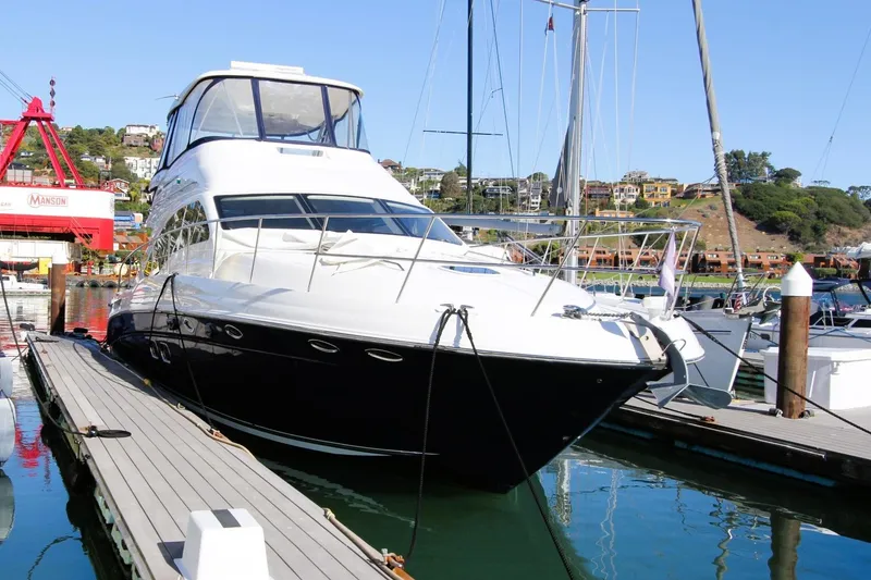 Slide: The Image of 2007 Sea Ray 580 Sedan Bridge yacht docked at marina. - 0
