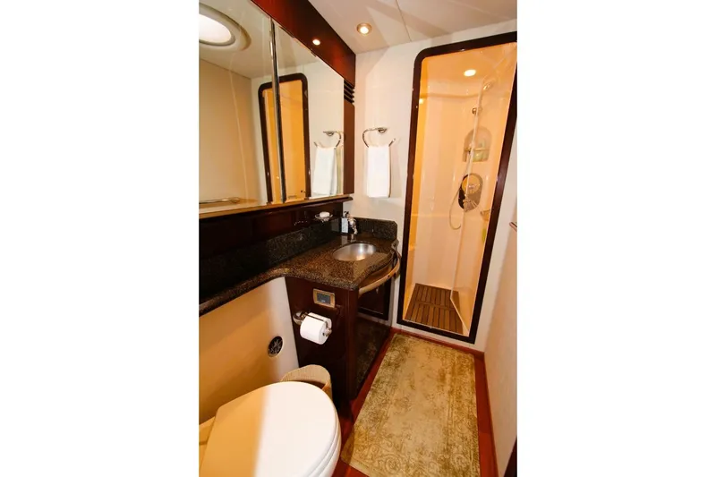 Slide: The Image of Luxurious bathroom in 2007 Sea Ray 580 Sedan Bridge yacht with modern amenities. - 14