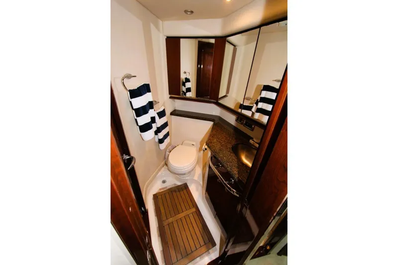 Slide: The Image of Luxurious bathroom in 2007 Sea Ray 580 Sedan Bridge yacht with modern fixtures. - 25