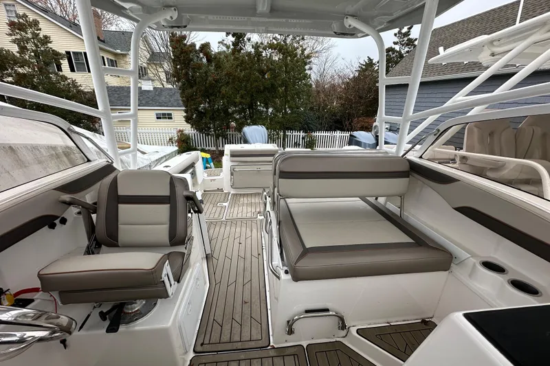 Slide: The Image of 2022 Cutwater C-24 DC boat interior with seating and deck view. - 9