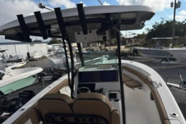 Slide: The Image of 2023 Sea Pro 259 Deep V CC boat with center console and dual seating. - 10