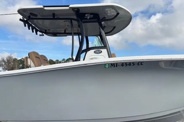 Slide: The Image of 2023 Sea Pro 259 Deep V CC boat with sleek design and modern features. - 3