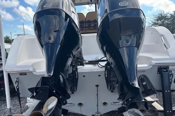 Slide: The Image of 2023 Sea Pro 259 Deep V CC with dual outboard engines, rear view. - 4