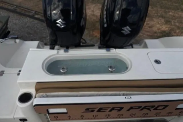 Slide: The Image of 2023 Sea Pro 259 Deep V CC boat with dual Suzuki engines. - 6