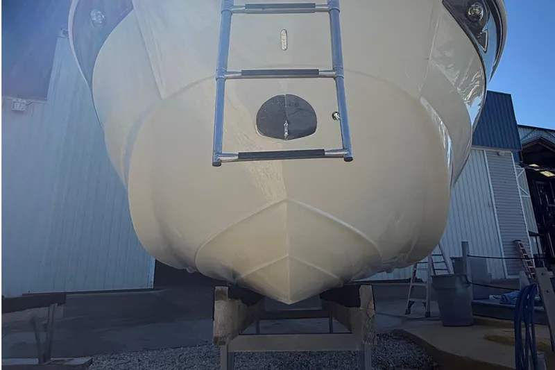 Slide: The Image of 2022 Crownline Eclipse E235 XS boat on a trailer, viewed from the front. - 20