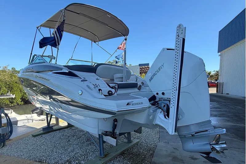 Slide: The Image of 2022 Crownline Eclipse E235 XS boat with Mercury engine on display. - 5