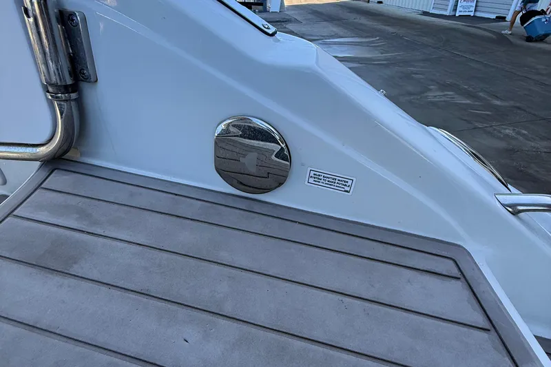 Slide: The Image of 2022 Crownline Eclipse E235 XS boat deck with stainless steel fittings. - 56