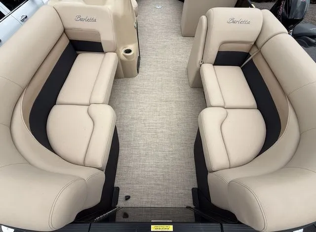 Slide: The Image of Luxurious seating on 2020 Barletta Boats C20Q with beige upholstery and spacious layout. - 4