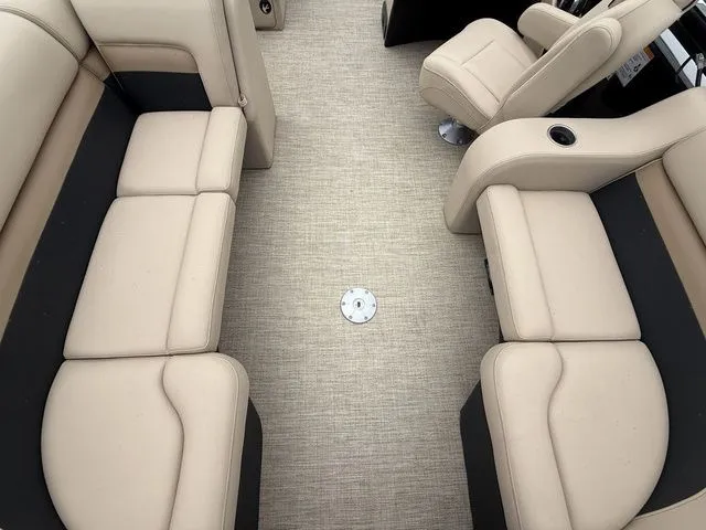 Slide: The Image of Interior of 2020 Barletta Boats C20Q with beige seating and carpeted floor. - 8