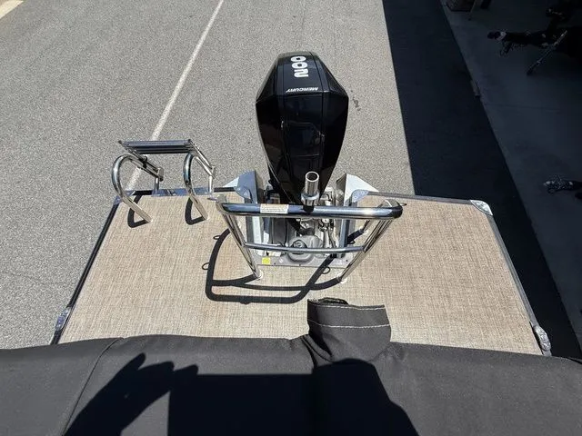 Slide: The Image of 2021 Barletta Boats C24Q with outboard motor on trailer, rear view. - 8