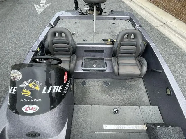 Slide: The Image of 2008 Bee Line Super Vee boat interior with dual seats and steering console. - 15
