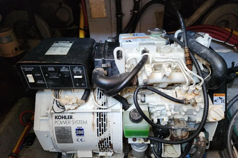 Slide: The Image of Engine room of 2001 Silverton 392 Motor Yacht with Kohler power system. - 33