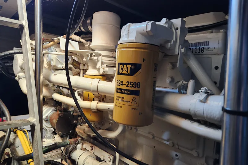 Slide: The Image of Engine room of 2001 Silverton 392 Motor Yacht with CAT oil filter. - 35