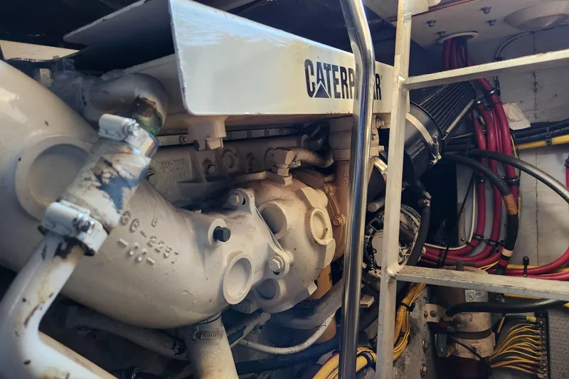 Slide: The Image of Engine room of 2001 Silverton 392 Motor Yacht with Caterpillar engine components. - 36