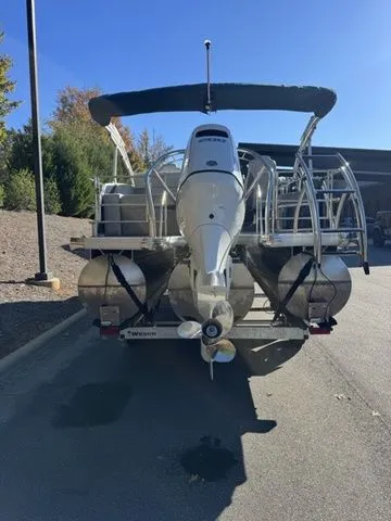 Slide: The Image of 2022 Godfrey Pontoons Monaco 235, rear view, parked outdoors on a sunny day. - 10