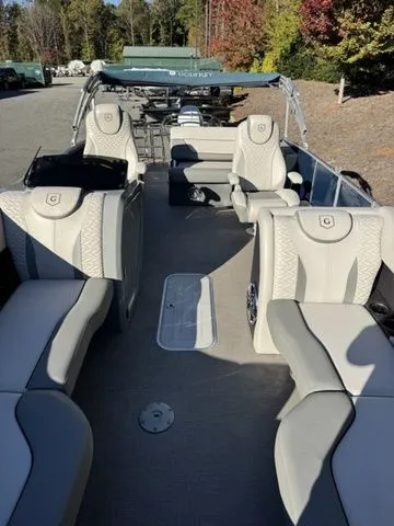 Slide: The Image of 2022 Godfrey Pontoons Monaco 235 with luxurious seating and spacious deck. - 5