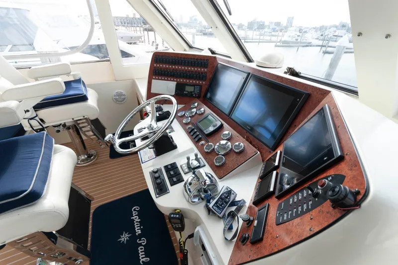 Slide: The Image of Helm of 2007 Novatec 55 Islander CPMY with modern navigation equipment and controls. - 12