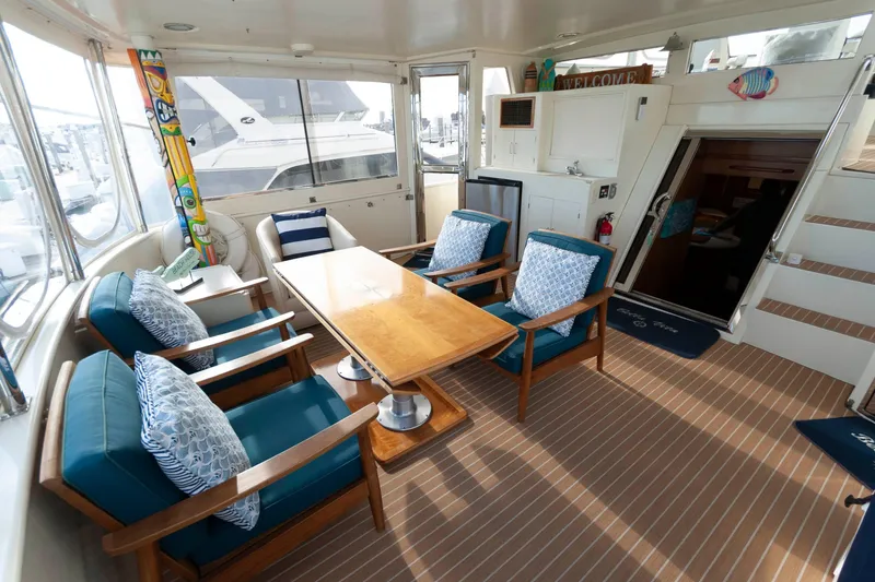Slide: The Image of Luxurious 2007 Novatec 55 Islander CPMY yacht interior with elegant seating and wooden table. - 15