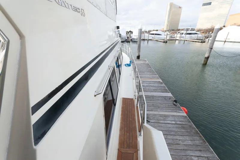 Slide: The Image of 2007 Novatec 55 Islander CPMY yacht docked at marina, side view. - 20