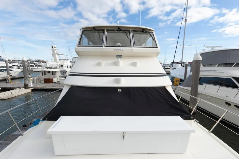 Slide: The Image of 2007 Novatec 55 Islander CPMY yacht docked at marina under blue sky. - 22