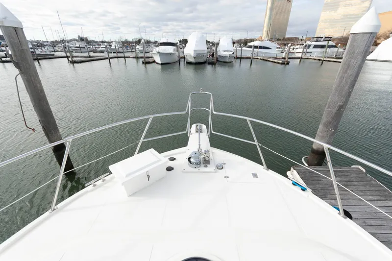 Slide: The Image of Bow view of 2007 Novatec 55 Islander CPMY yacht docked in a marina. - 24