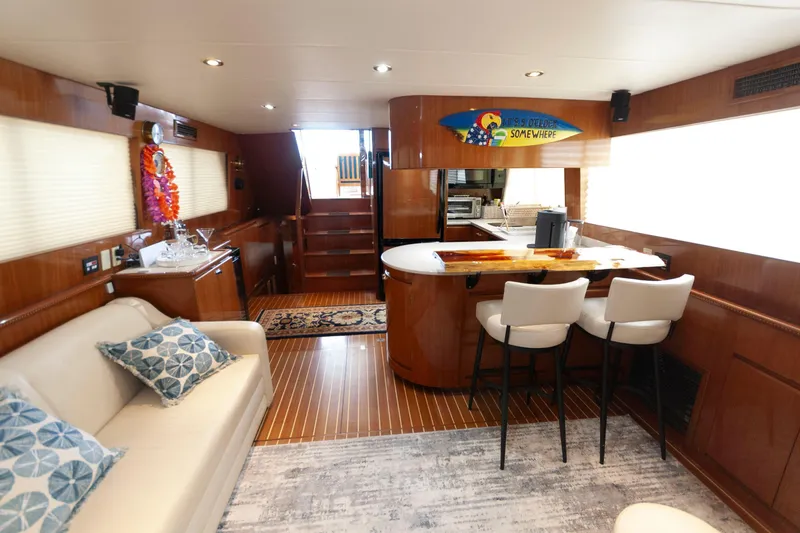 Slide: The Image of Luxurious interior of 2007 Novatec 55 Islander CPMY yacht with elegant seating and bar area. - 28