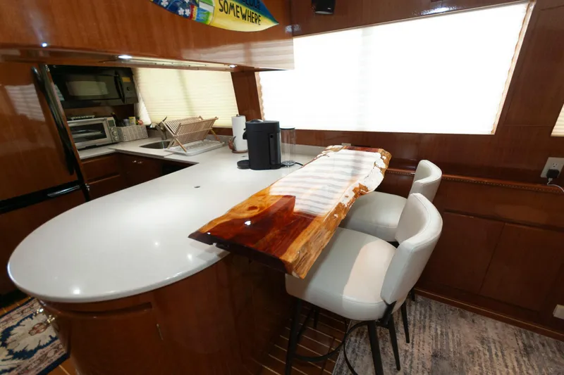 Slide: The Image of Luxurious kitchen interior of 2007 Novatec 55 Islander CPMY yacht with modern amenities. - 29