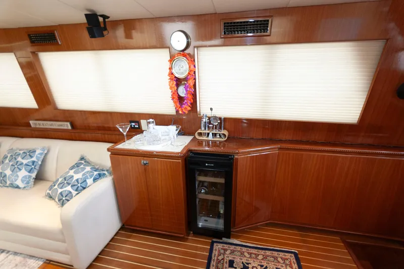 Slide: The Image of Luxurious interior of 2007 Novatec 55 Islander CPMY yacht with elegant wood finish and mini bar. - 30